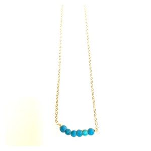 Turquoise beads on silver chain
